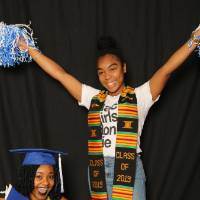 two friends taking picture at GradFest